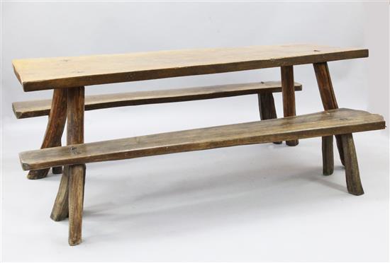 A rustic style oak refectory table & pair benches